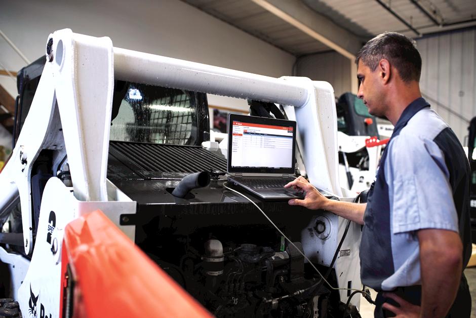 technician using laptop